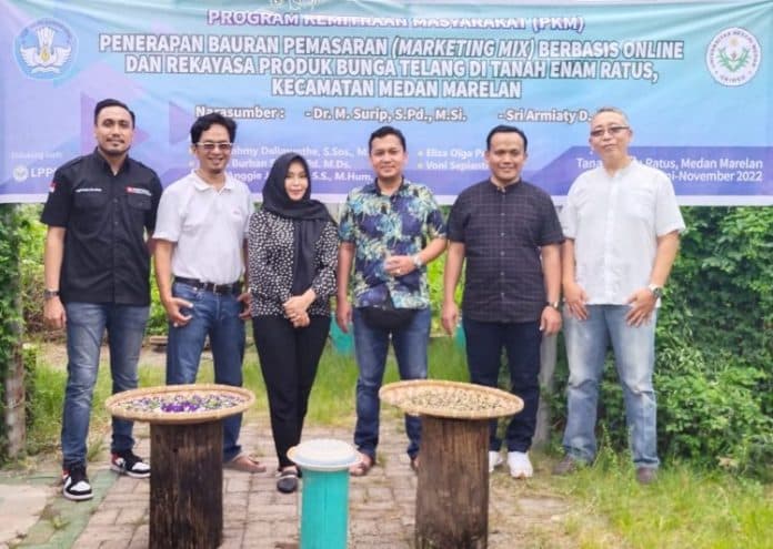 dosen_unimed_bantu_pemasaran_online_produk_bunga_telang