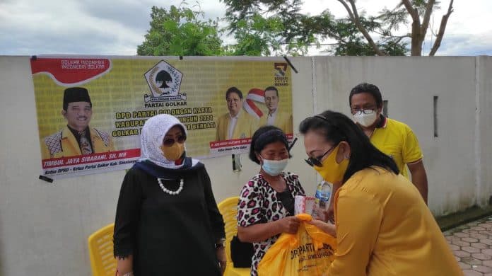 dpd_partai_golkar_simalungun_gelar_bakti_sosial_dan_vaksinasi