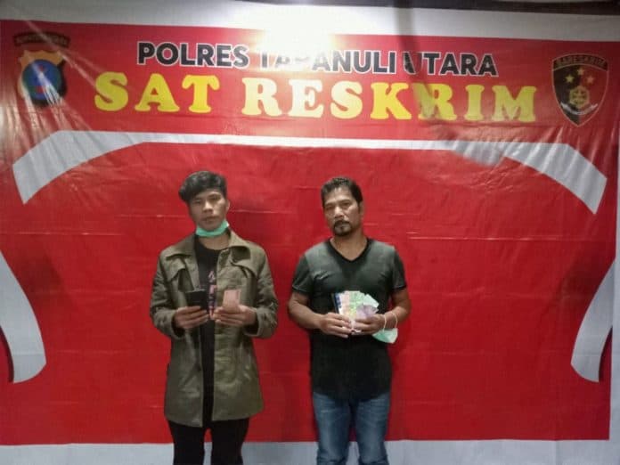 dua_pemain_judi_toto_gelap_diamankan_sat_reskrim_polres_taput