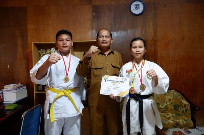 dua_siswa_sman_1_parbuluan_kabupaten_dairi_raih_medali_di_kejurda_dan_kejurnas