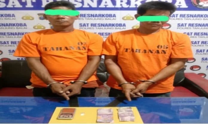 dua_warga_sei_kepayang_barat_asahan_diringkus_terlibat_peredaran_sabu