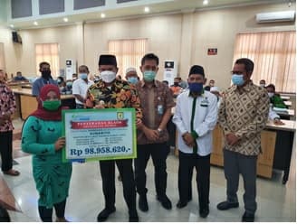 empat_ahli_waris_perangkat_desa_terima_santunan_bpjamsostek_tanjung_morawa