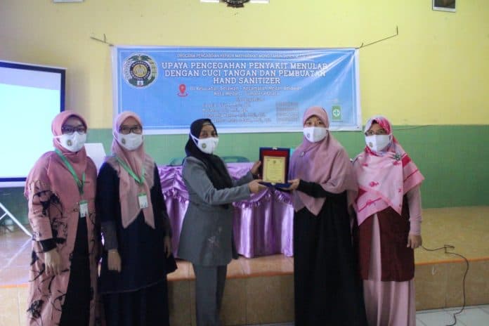 farmasi_usu_beri_penyuluhan_cegah_covid_19_di_belawan