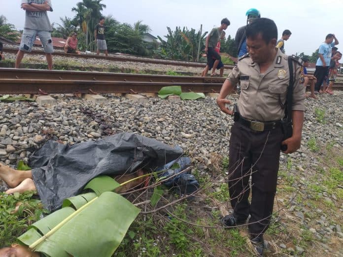 ferry_pasaribu_tewas_bunuh_diri_di_rel_kereta_api