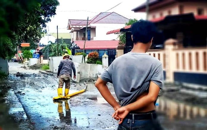 fokus_lensa_saluran_drainase_solusi_atasi_banjir_atau_timbulkan_genangan_baru
