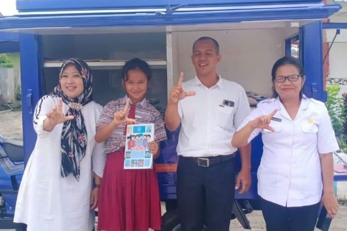 gerobak_baca_dinas_perpustakaan_simalungun_kunjungi_sd_di_dua_kecamatan
