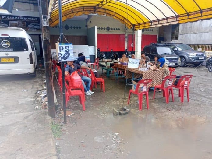 hujan_dan_banjir_sejumlah_tps_di_kota_medan_minim_partisipasi_pemilih