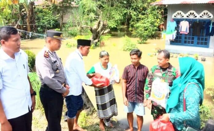 hujan_deras_rendam_36_rumah_warga_di_lima_puluh_batu_bara