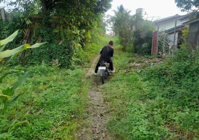 jalan_persaudaran_siantar_rusak_parah_warga_takut_berharap_perbaikan