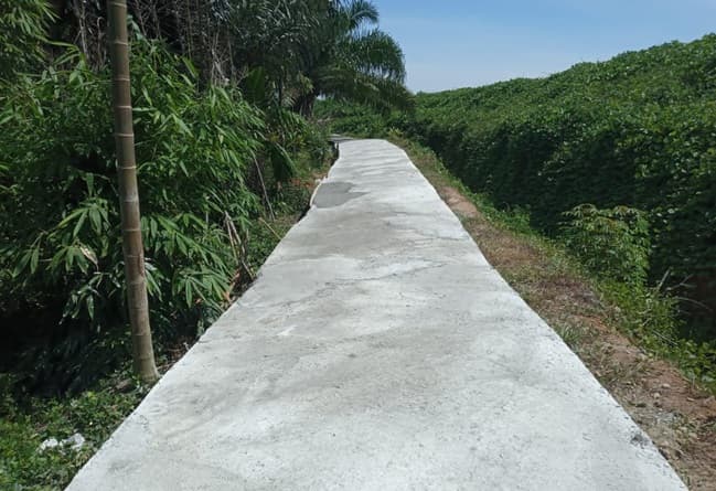 jalan_rabat_beton_di_tpu_kristen_galang_telan_anggaran_dd_sebesar_rp121_juta