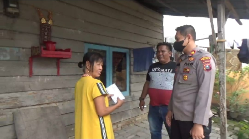 jelang_waisak_kapolsek_sunggal_beri_tali_asih_kepada_umat_buddha