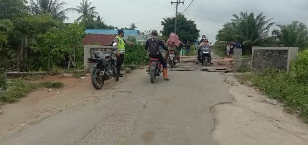 jembatan_rusak_di_bandar_khalipah_kerap_dijadikan_ajang_pungli
