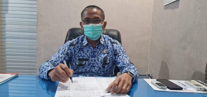 jokowi_longgarkan_pemakaian_masker_pemkab_asahan_tunggu_surat_edaran