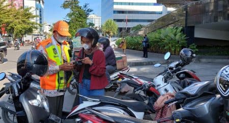 juru_parkir_di_medan_kini_difasilitasi_jaminan_sosial