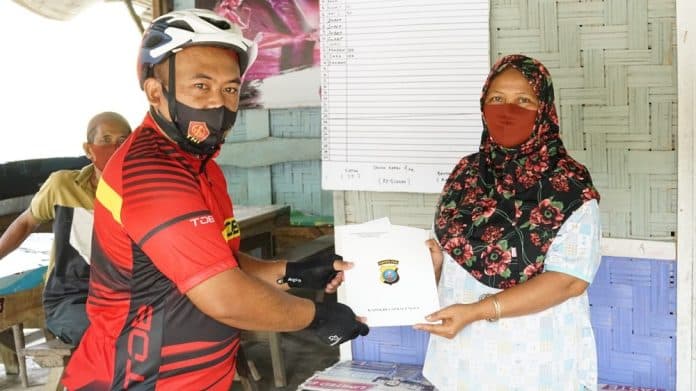 kapolres_simalungun_bantu_tambahan_modal_usaha_ke_umkm_di_panei