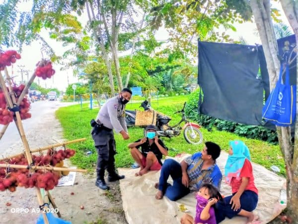 kapolsek_lima_puluh_minta_warga_patuhi_protokol_kesehatan