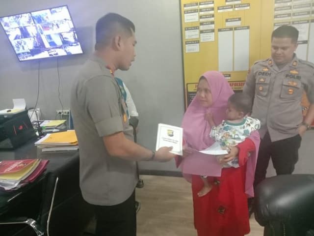 kapolsek_percut_bantu_tali_asih_bocah_penderita_jantung_bocor