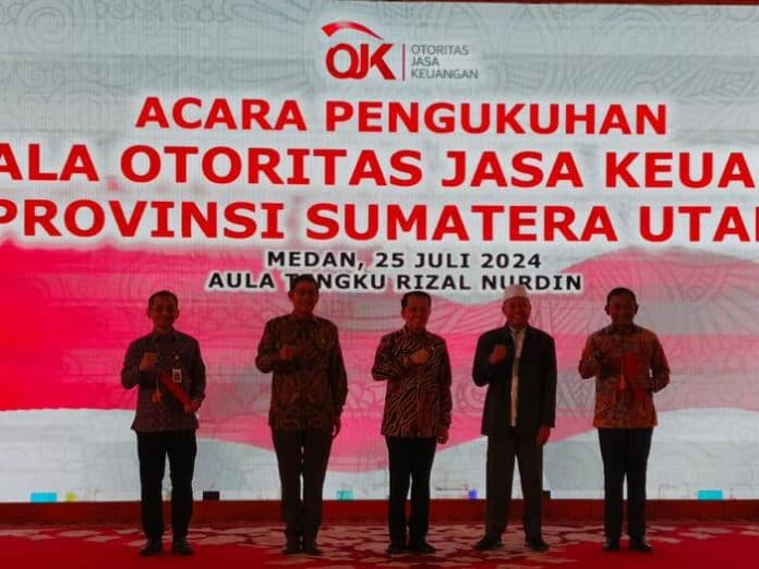 kepala_ojk_sumut_khoirul_muttaqien_resmi_dikukuhkan