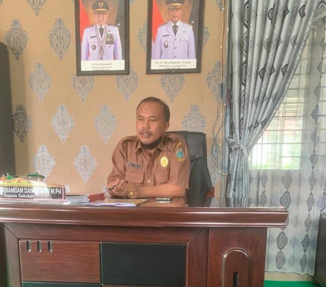 kepala_smkn_1_sidikalang_dicopot_dan_jadi_guru_biasa_di_sekolahnya