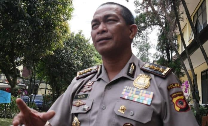 keterlaluan_saat_menggrebek_kejahatan_online_polisi_dikeroyok_puluhan_warga_nigeria