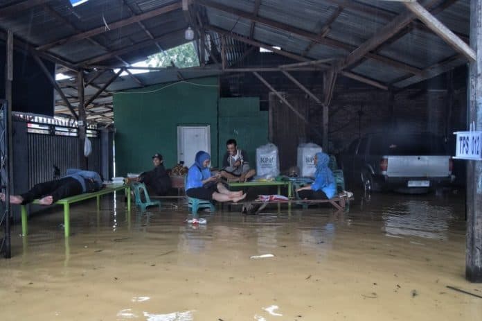 kondisi_pelaksanaan_pilkada_di_kota_medan_saat_dilanda_banjir