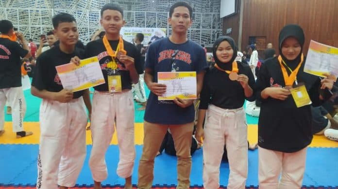 kontingen_tarung_derajat_deli_serdang_lampaui_target_medali_pada_kejurda_junior_di_siantar