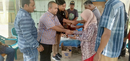 korban_kebakaran_di_paluta_terima_donasi_dari_parsadaan_parpaluta