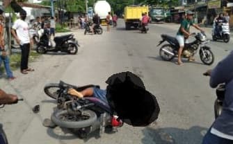 kurang_hati_hati_pengendara_ini_tewas_digilas_ban_belakang_truk_tangki