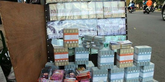 lebaran_tahun_ini_jasa_penukaran_uang_sepi_peminat