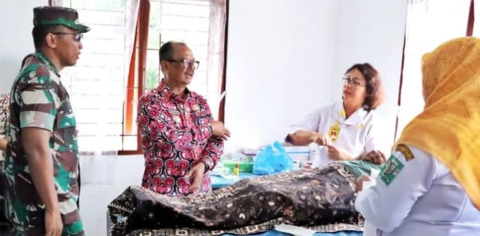 lewat_program_tmmd_warga_tapian_dolok_simalungun_dapat_layanan_kb_gratis