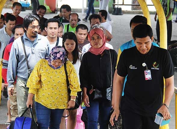 malaysia_bawa_pulang_15_korban_kejahatan_dunia_maya_kamboja