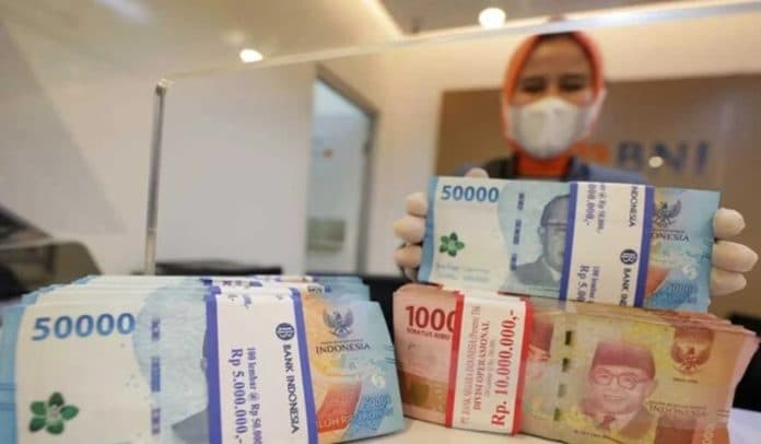 mata_uang_rupiah_melemah_ihsg_berpotensi_terkoreksi