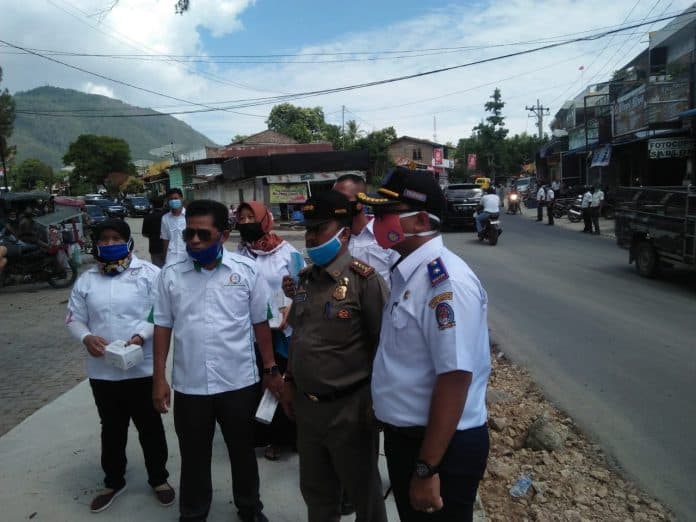 memasuki_new_normal_dpp_stgi_bagi_masker_di_toba