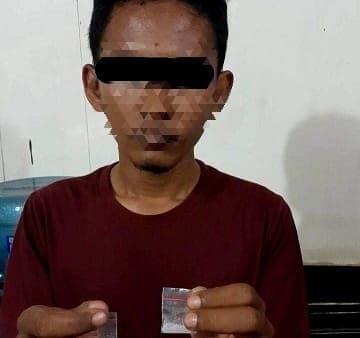 miliki_butiran_kristal_pria_di_asahan_diangkut_ke_polsek_air_joman