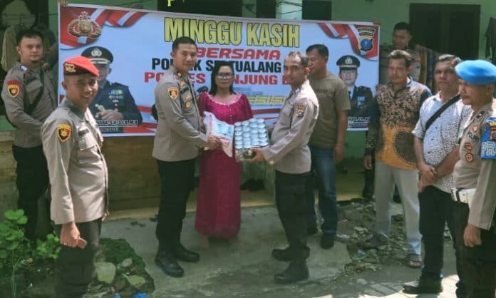minggu_kasih_polres_tanjungbalai_berbagi_dengan_warga_kurang_mampu