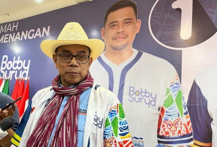 mobilnya_dilempar_batu_usai_debat_tim_bobby_nasution_lapor_polisi