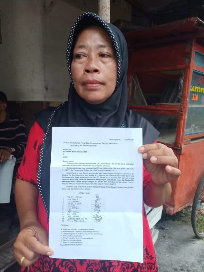 mohon_tidak_digusur_para_pedagang_eks_bioskop_ria_siantar_temui_dirut_pd_aij