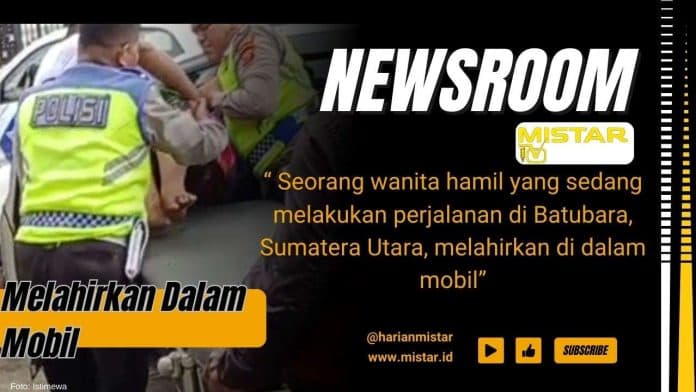 newsroom_polisi_bantu_evakuasi_warga_melahirkan_di_dalam_mobil