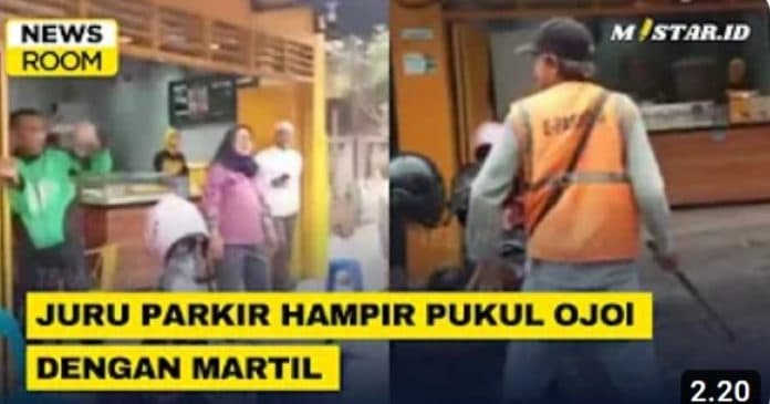 newsroom_viral_juru_parkir_hampir_pukul_ojol_dengan_martil_di_medan