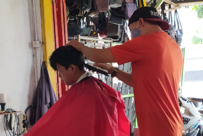 pandemi_covid_19_pangkas_heri_tetap_fokus_dan_mencintai_pekerjaannya