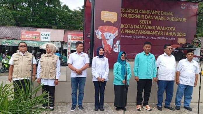 paslon_bagi_uang_saat_deklarasi_kampanye_damai_bawaslu_siantar_sebut_tak_melanggar