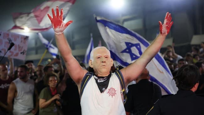 pedemo_israel_selak_pm_netanyahu_saat_pidato_anda_memalukan_ayah_saya_terbunuh