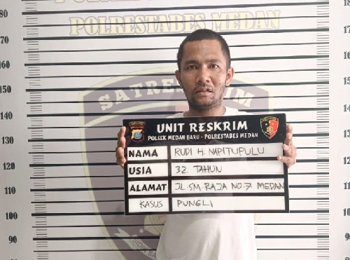 pelaku_pungli_serahkan_diri_ke_polsek_medan_baru