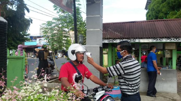 pembagian_rapor_di_siantar_wajibkan_protokol_kesehatan_covid_19