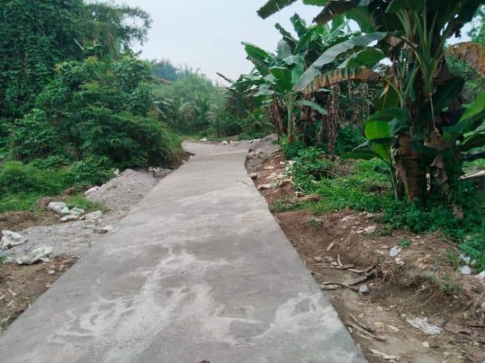pembangunan_jalan_rabat_beton_di_desa_silue_lue_deli_serdang_rampung