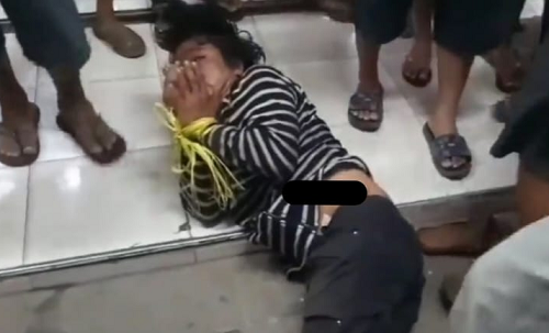 pencuri_7_botol_selai_dihakimi_warga_di_medan_kedua_tangan_dan_kaki_diikat