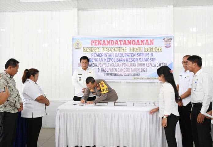 pengamanan_pilkada_2024_bupati_dan_kapolres_samosir_teken_nphd