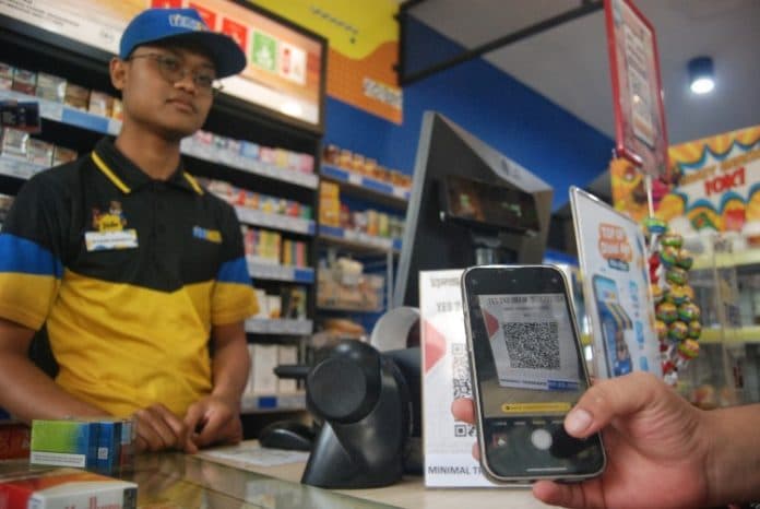 penggunaan_qris_pada_usaha_mikro_di_medan_tinggi