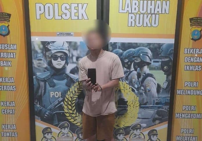 perampok_dengan_modus_minta_uang_parkir_dibekuk_polsek_labuhan_ruku