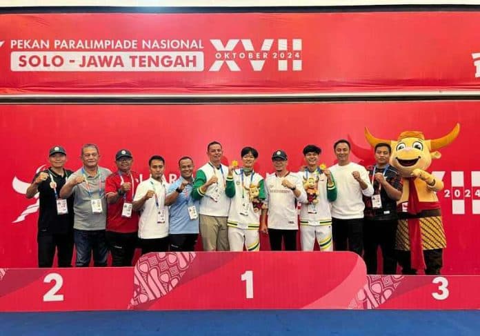 perdana_dipertandingkan_atlet_taekwondo_sumut_sukses_juara_umum_peparnas